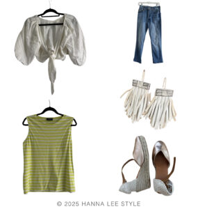 travel capsule wardrobe outfit example with white linen bolero style top that ties in the front, yellow stripe sleeveless top, pair of denim, wedge shoe and white fringe earrings